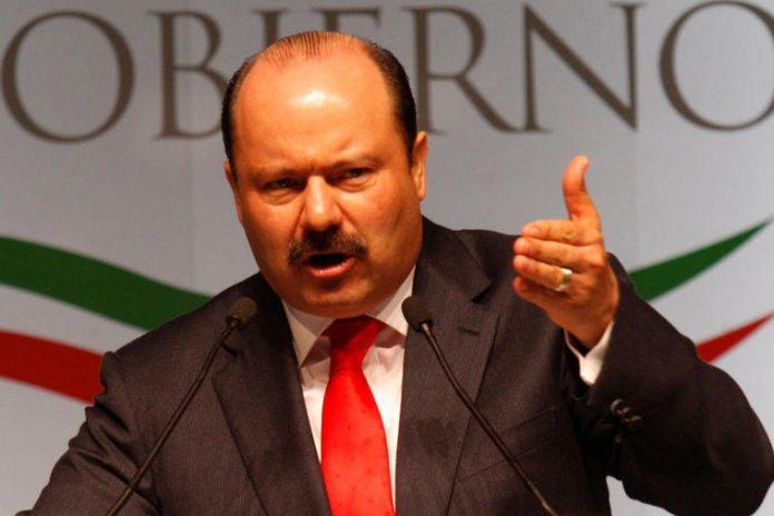 Duarte delivers speech during his annual Government report at the University Cultural Center in Ciudad Juarez